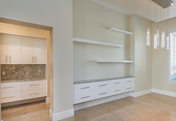The image shows two views of a remodeled living room.